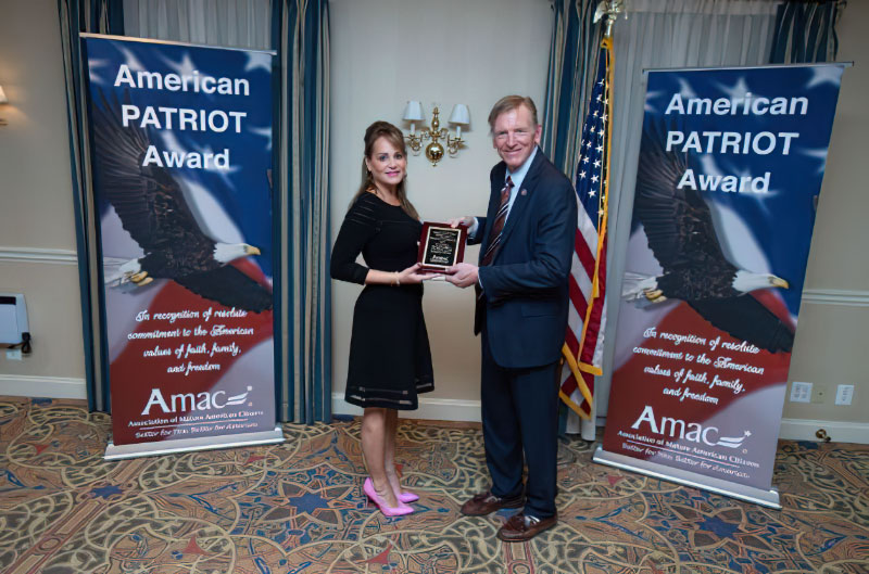 Congressman Gosar accepts the American PATRIOT Award from AMAC CEO Rebecca Weber on Capitol Hill.