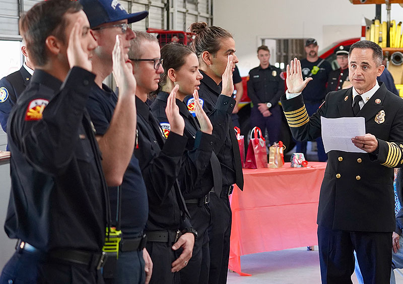 Fire Chief Durre swears in new employees L-R: Firefighters Spencer Smith, Troy Lovelady, Travis Mayo, Imani Moore, Mike Hormell